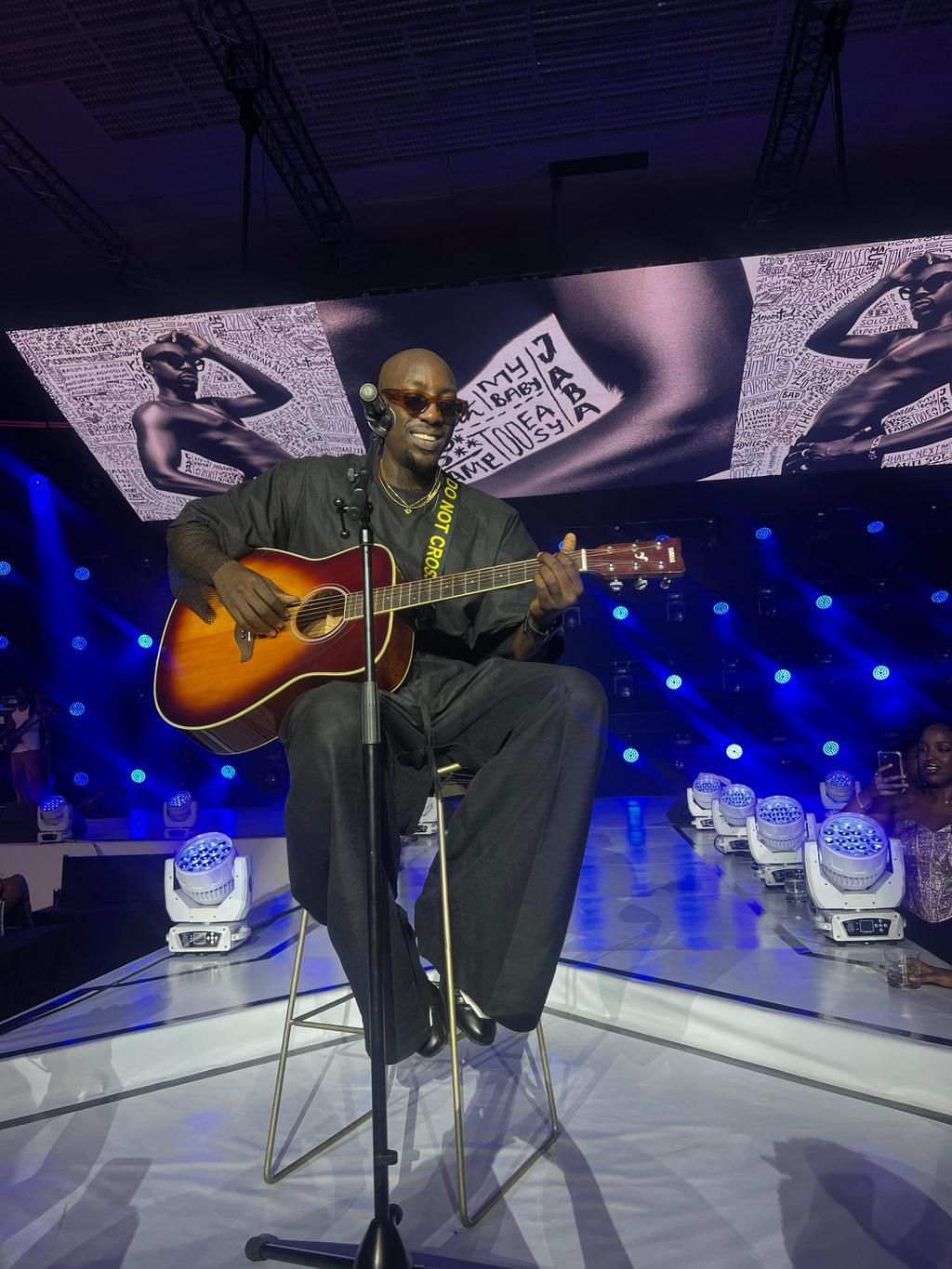 Bien excited the crowd with a guitar performance