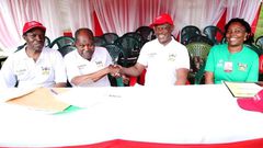 Dr. Martin Aliker (2nd L) shakes hands with the Vice Chancellor, Prof. Barnabas Nawangwe (2nd R) at the successful conclusion of the Second Edition of the Makerere University Endowment Fund (MakEF) Run (MakRun) on Sunday, March 25, 2018 as Prof. Willia...