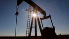 FILE PHOTO: The sun is seen behind a crude oil pump jack in the Permian Basin in Loving County, Texas, U.S., November 22, 2019. REUTERS/Angus Mordant