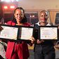Jubilee's Diana Ssempasa Ndege (L) and  Nabatanzi Rosemary display their certificates