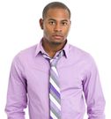 A man with a loose neck tie