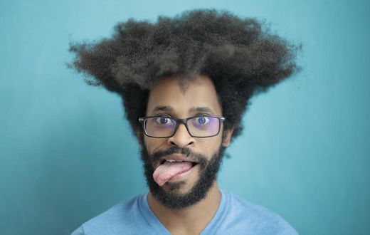 A young man with shaggy hair