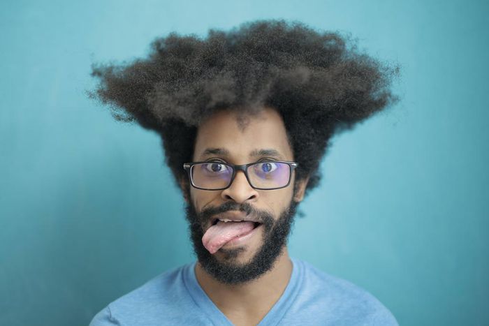 A young man with shaggy hair
