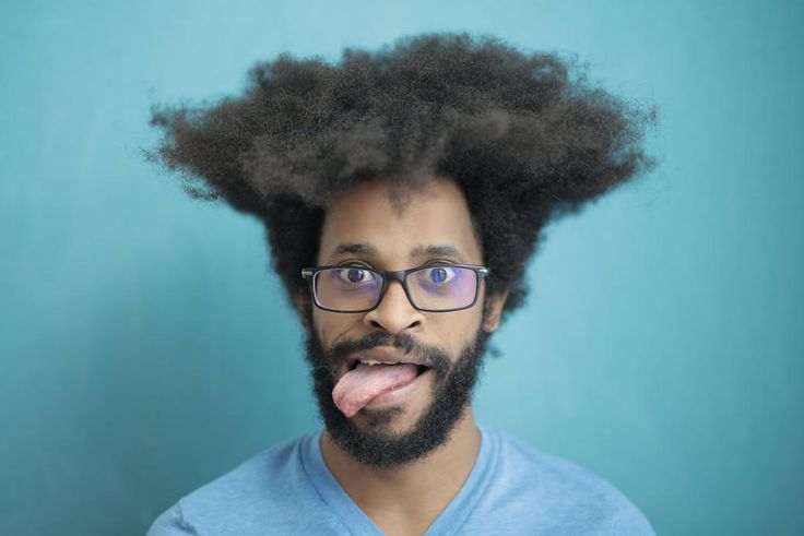A young man with shaggy hair