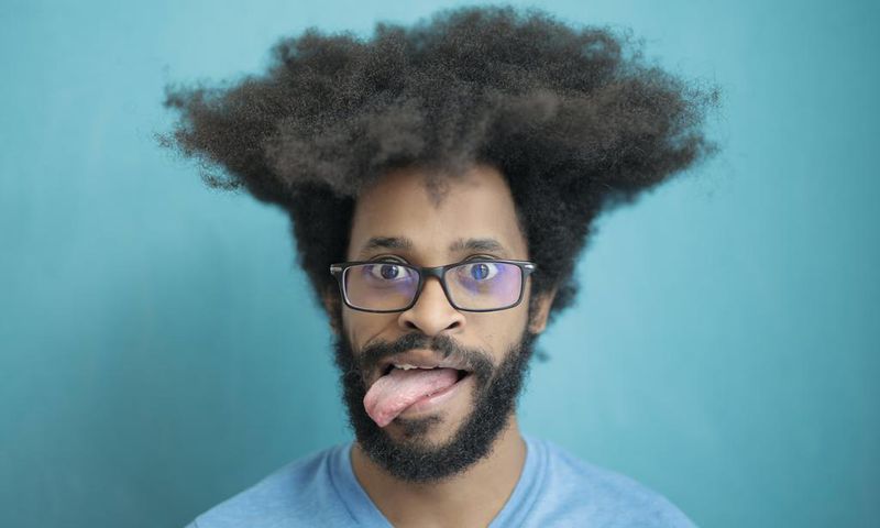 A young man with shaggy hair