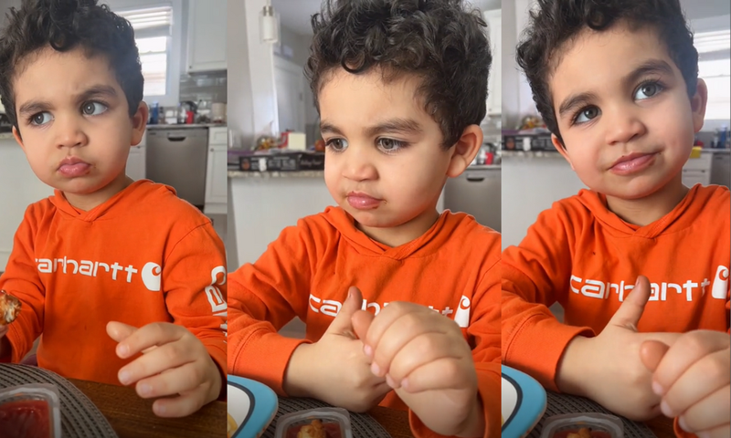 Adorable baby boy reviewing chef's cooking
