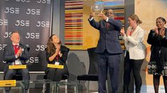 Receiving the award on behalf of Uganda