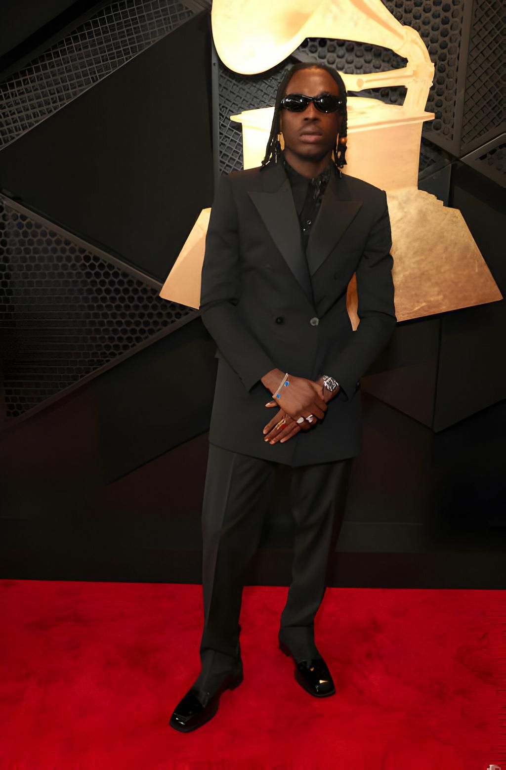 LOS ANGELES, CALIFORNIA - FEBRUARY 04: Fireboy DML attends the 66th GRAMMY Awards at Crypto.com Arena on February 04, 2024 in Los Angeles, California. (Photo by Kevin Mazur/Getty Images for The Recording Academy)