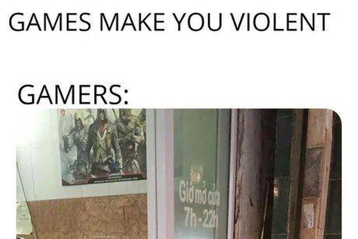 Gamer petting a cat/Courtesy/eBaumsworld