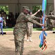 Gen Muhoozi Kainerugaba received instruments of office from the outgoing CDF Gen Mbasu Mbadi