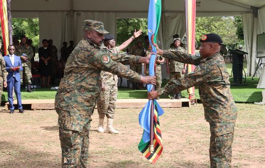 Gen Muhoozi Kainerugaba received instruments of office from the outgoing CDF Gen Mbasu Mbadi