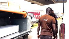 Gloria's body on arrival at Entebbe International Airport