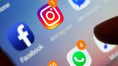 Meta apps on a phone. Photo: Yui Mok/Zuma Press