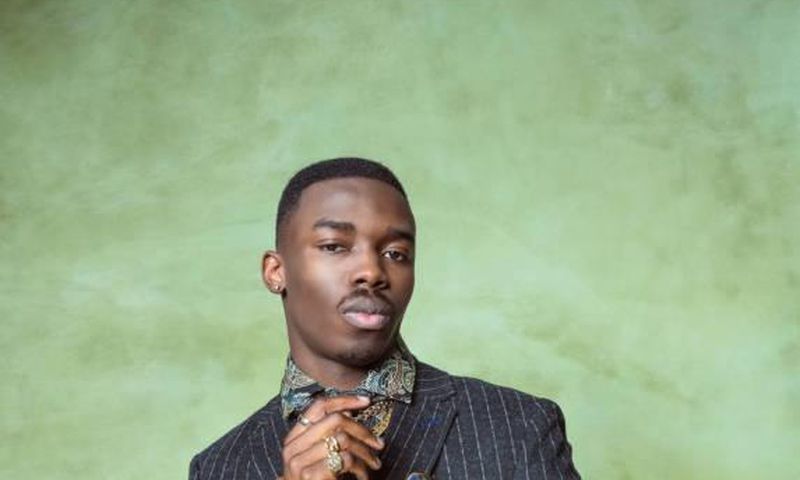 A man well-dressed for a photo