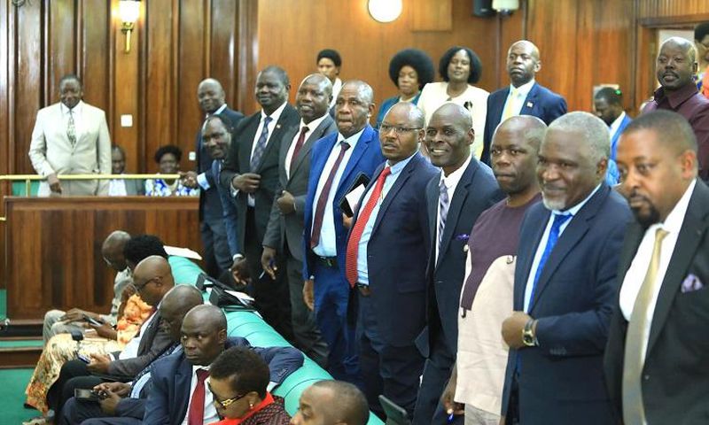 Members rise to catch the eye of the Speaker during plenary on Friday, April 12
