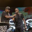 Digital content creator and comedian, Uncle Mo on stage with Swangz Avenue's Benon Mugumbya