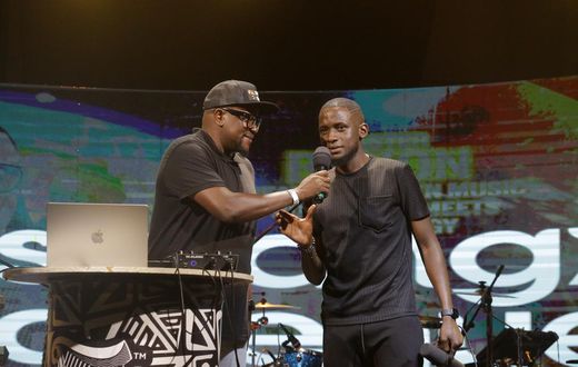 Digital content creator and comedian, Uncle Mo on stage with Swangz Avenue's Benon Mugumbya