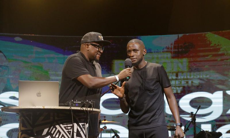 Digital content creator and comedian, Uncle Mo on stage with Swangz Avenue's Benon Mugumbya