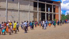 Congregants leaving Worship House Church in Nansana,
