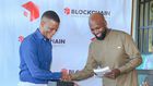 Mr Reginald Tumusiime (L) took over from Kwame Rugunda