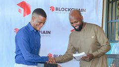 Mr Reginald Tumusiime (L) took over from Kwame Rugunda