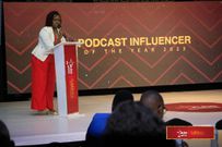 Eunice Gachugi speaking on behalf of Saladin Media at the awards