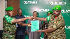 Deputy Chief of Defence Forces Lt. Gen. Sam Okiding (right) handed over to Maj. Gen Marius Ngendabanka