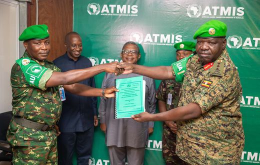 Deputy Chief of Defence Forces Lt. Gen. Sam Okiding (right) handed over to Maj. Gen Marius Ngendabanka
