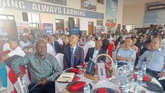 Gov't spokesperson Ofwono Opondo and the executives of Double Q at the 10 anniversary celebrations