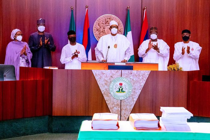 Vice-President, Yemi Osinbajo; Senate President Ahmad Lawan; Speaker of the House of Representatives, Femi Gbajabiamila; Secretary to the Government of the Federation, Boss Mustapha and Minister for Budget and Finance, Zainab Ahmed witnessed the signin...