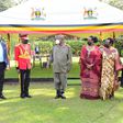 President Yoweri Museveni poses with Gen Kale Kayihura and his family at the retirement function