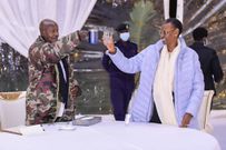 President Yoweri Museveni and Janet make a toast