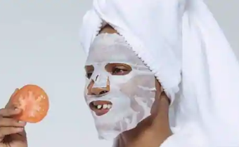 Lady treating her skin from acne