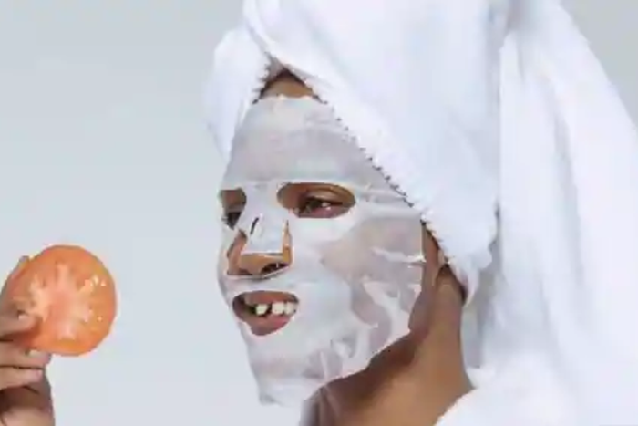 Lady treating her skin from acne