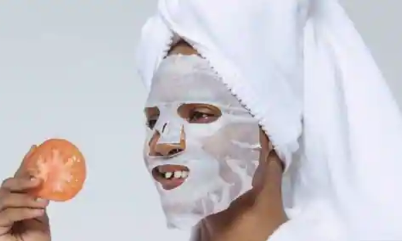 Lady treating her skin from acne