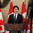 Canada's Prime Minister Justin Trudeau speaks with reporters during a news conference on Parliament Hill February 11, 2022 in Ottawa, Canada.
