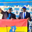Dick Denis Owani, the flagbearer for the Forum for Democratic Change (FDC) Party and party president (right)  Eng Patrick Amuriat