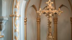 A golden crucifix [Image Credit: RDNE Stock Project]