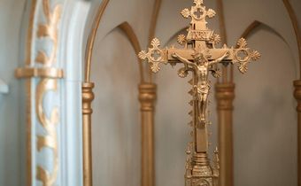 A golden crucifix [Image Credit: RDNE Stock Project]