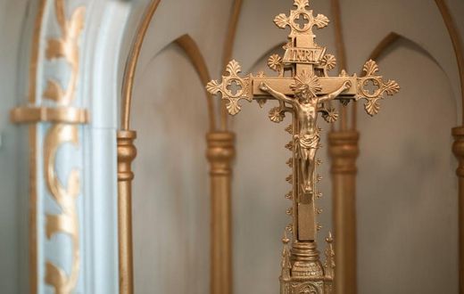 A golden crucifix [Image Credit: RDNE Stock Project]