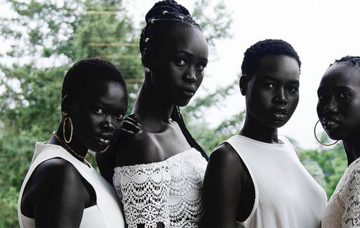 The South Sudanese, particularly the Dinka and Nuer ethnic groups, are known for their exceptionally deep, dark complexions