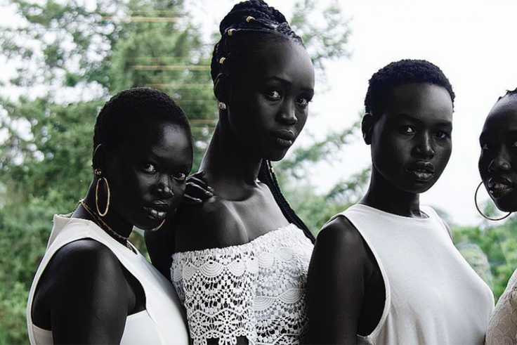 The South Sudanese, particularly the Dinka and Nuer ethnic groups, are known for their exceptionally deep, dark complexions
