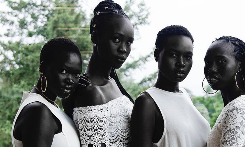 The South Sudanese, particularly the Dinka and Nuer ethnic groups, are known for their exceptionally deep, dark complexions