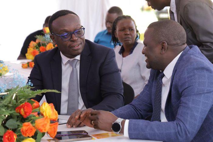 MD Post Bank - Julius Kakeeto, and MTN' Momo CEO - Richard Yego
