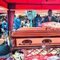 Bobi Wine lays a writh at the funeral of Joseph Nsamba