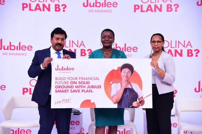 Jubilee Life CEO Sumit Kumar Gaurav together with COO Dorcus Kuhimbisa and Ms Sharon Tumushabe at the product launch