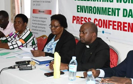 Fr. Hilary Muheezangango, the Caritas National Director (R) addressing press on Thursday ahead of the World Environment Day