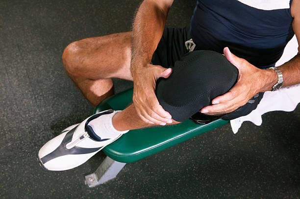 Man experiencing post work out pain