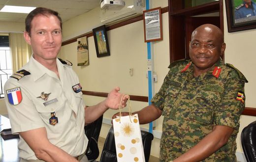 Maj. Gen. Jackson Bakasumba with Lt. Col. Yam Chollet