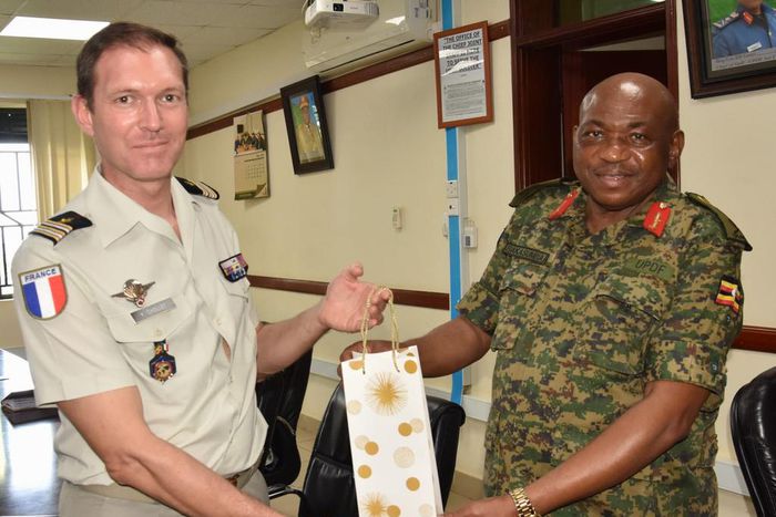 Maj. Gen. Jackson Bakasumba with Lt. Col. Yam Chollet